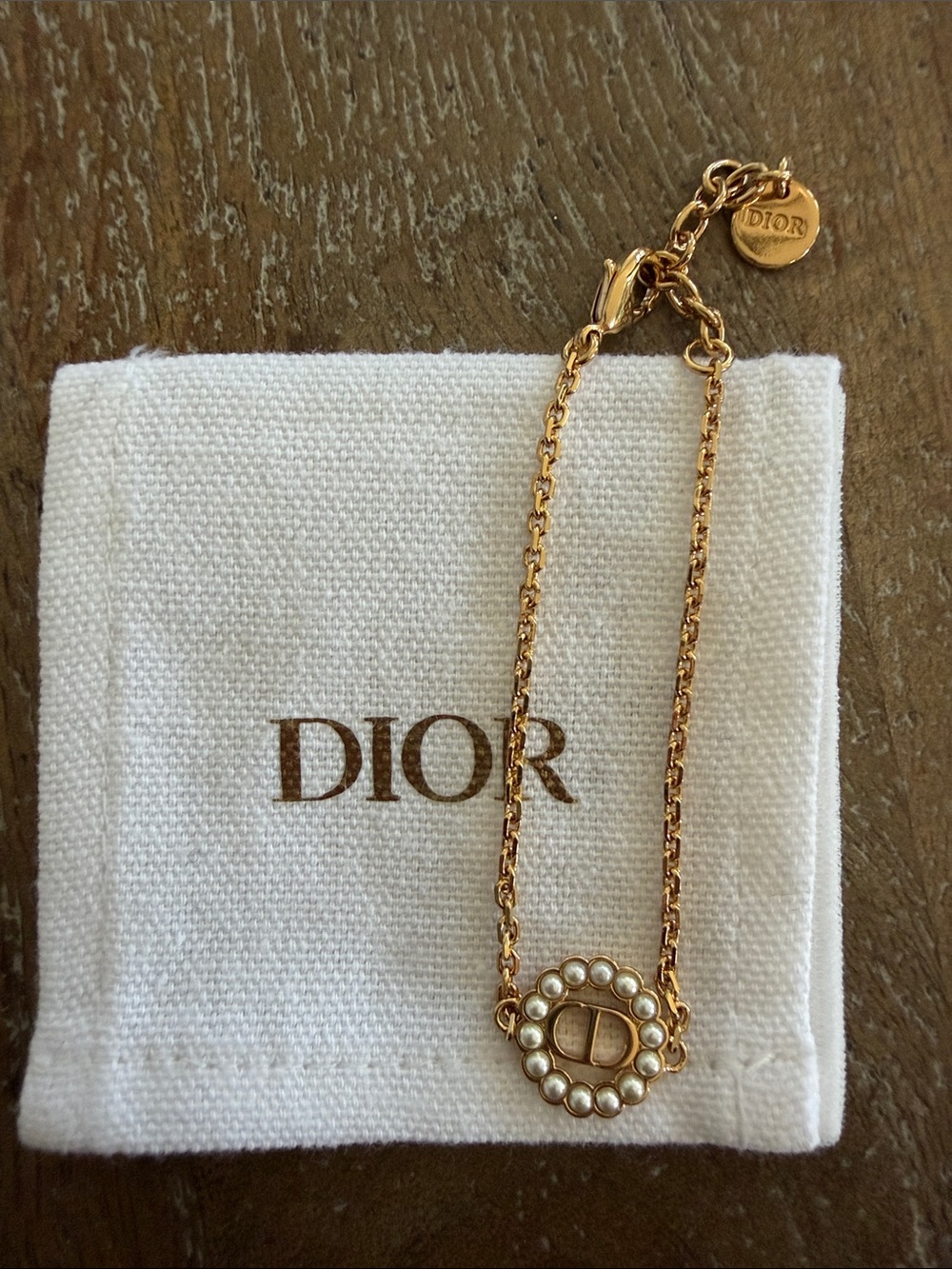 New authentic Dior petit CD bracelet, comes with box and bag